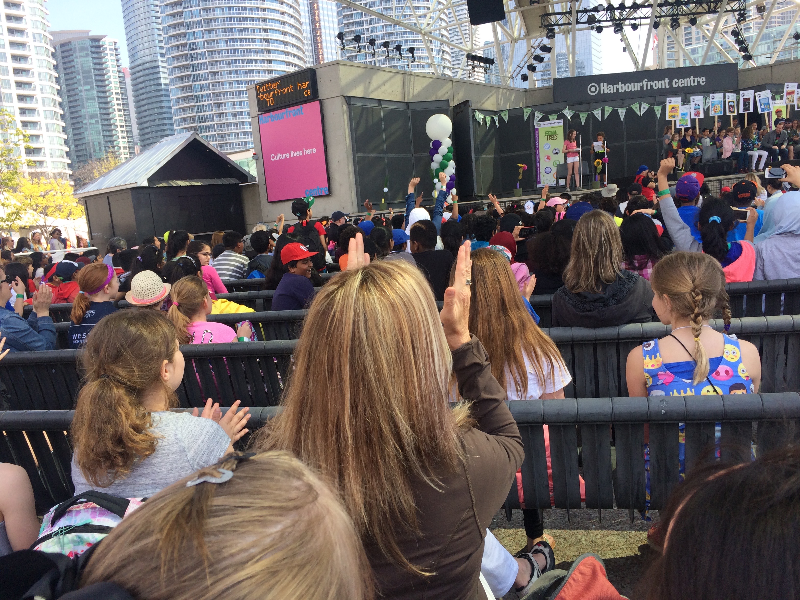 people watching award ceremony at Festival of Trees